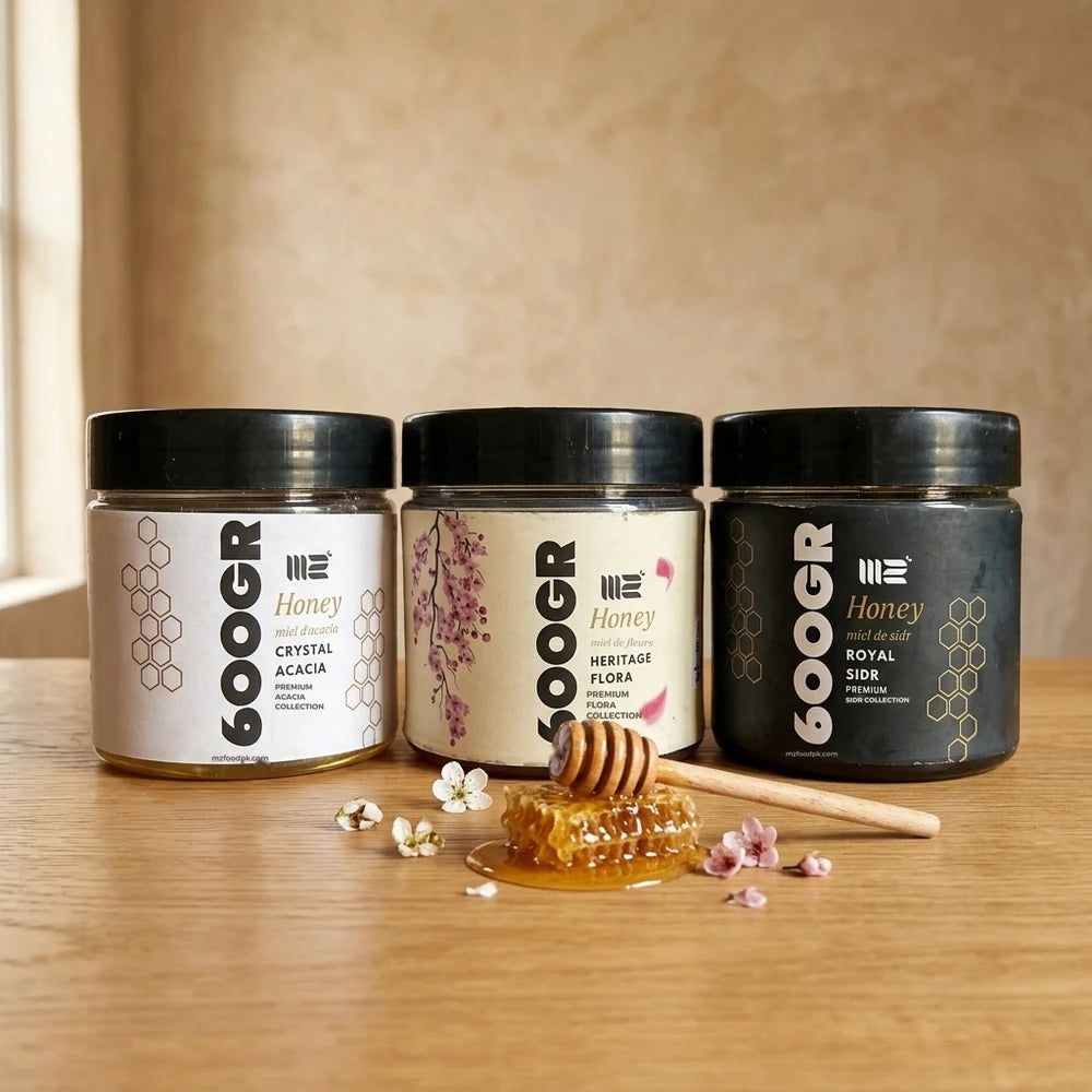MZ Crystal Acacia, Heritage Flora and Royal Sidr honey jars with honeycomb